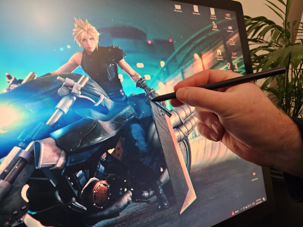 touch screen pen against the Wacom Cintiq Pro 27 tablet.