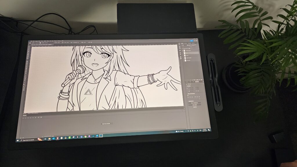 Top down view of the Wacom Cintiq Pro 27 tablet with some line art on it.