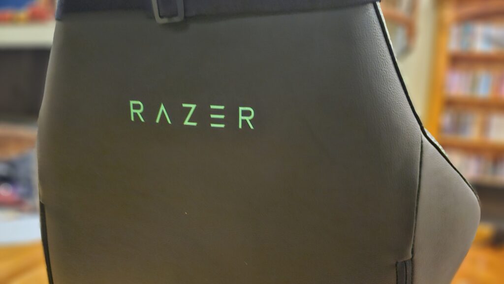 Back of the chair with rubber Razer logo.