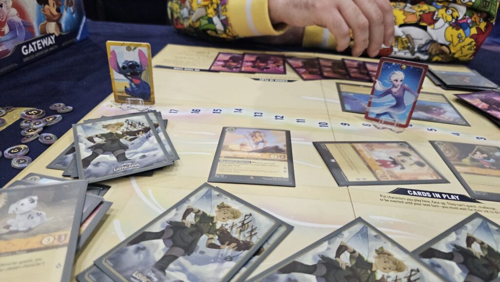 Game board featuring several cards and one player already at 20 lore points.